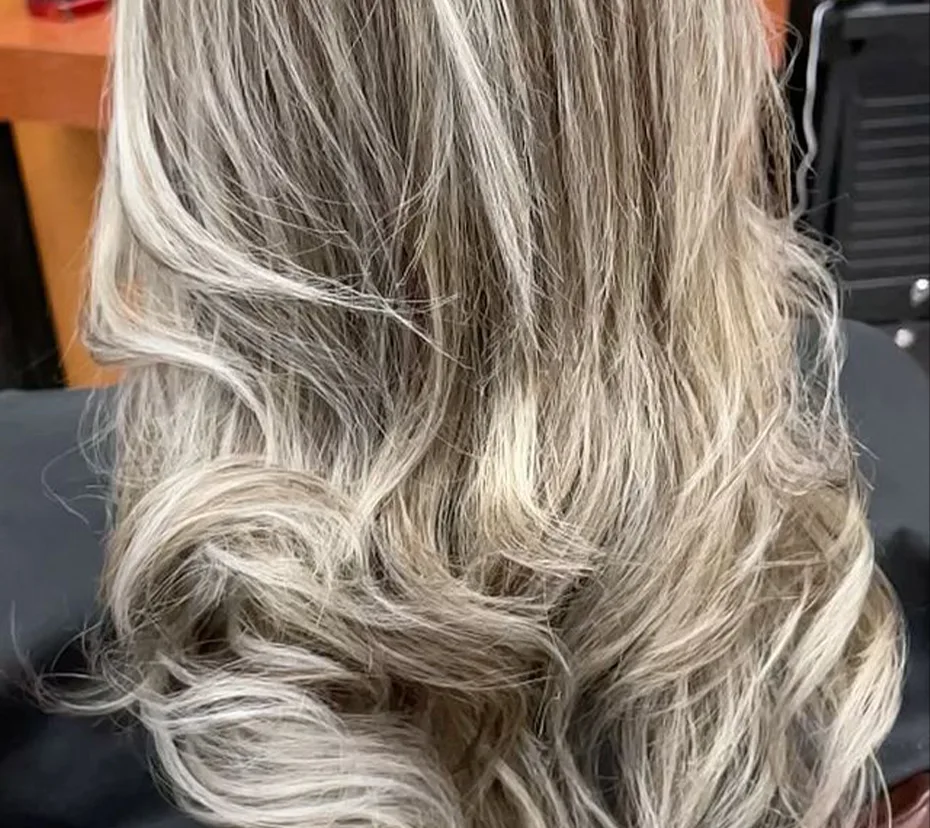 Silver blonde balayage with loose waves